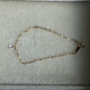 14k solid gold heart link bracelet 

1.7x 2.4mm